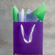 "This present doesn't suck" Purple Gift Bag