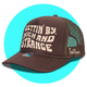 Gettin By Gettin High and Strange Trucker Hat